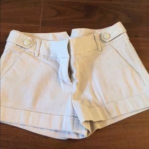 Tan and white stripped shorts